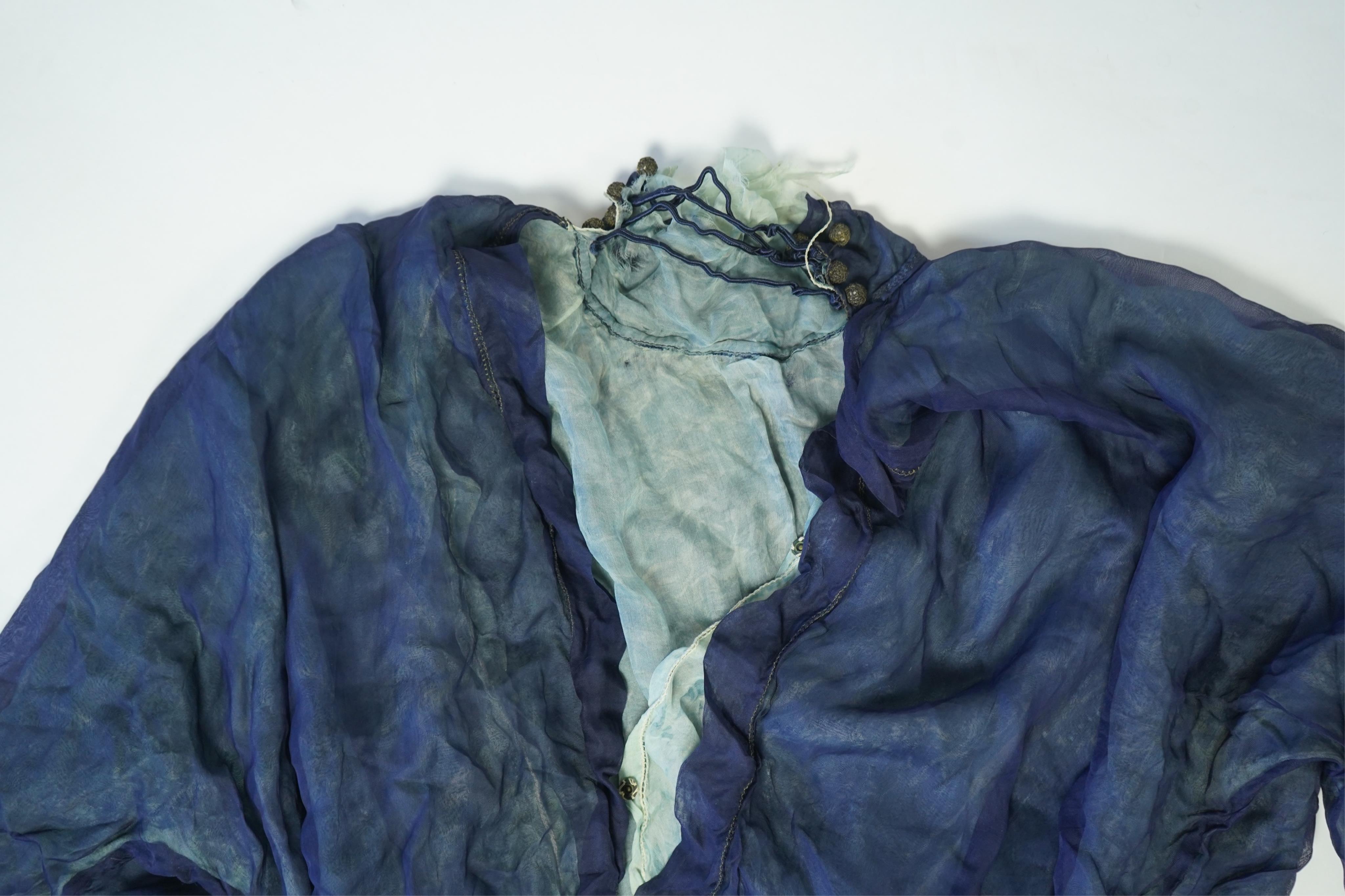 A 1940’s-50’s short sleeve lime green silk embroidered blouse, a pale pink silk crepe long sleeved blouse with white lace and a late 19th century navy silk chiffon blouse. Condition - the navy blouse is fragile but may b